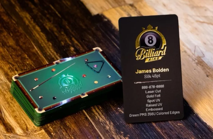 Billiard King business card printed on Silk 48pt stock with gold foil, spot UV, and green PMS colored edges