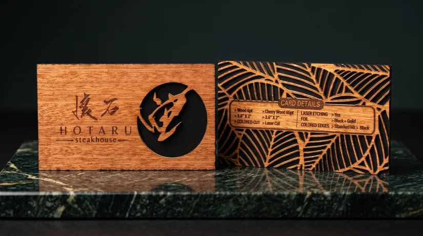 A real wood business card laser-cut and engraved for Hotaru Steakhouse, front and back.